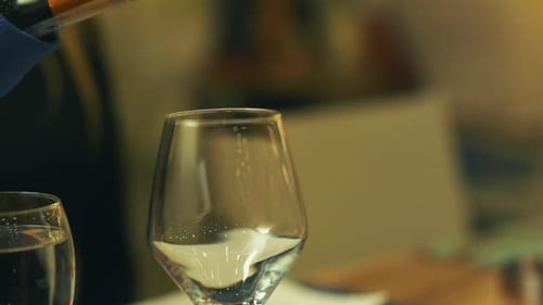 Red Wine Poured into Glass at Home