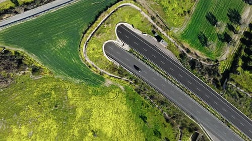 Highway Street Tunnel On The Hill In Spring Overhead