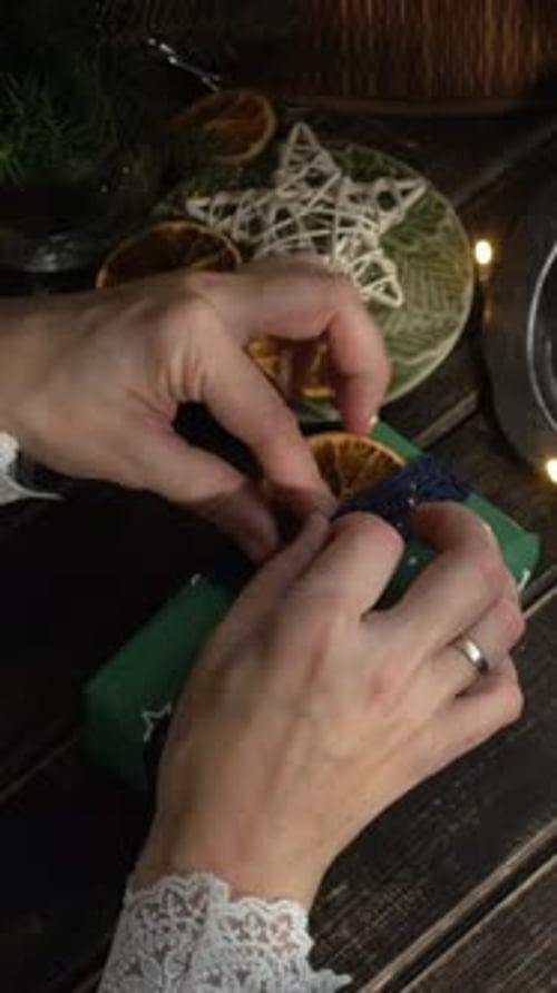 Vertical Video Person Preparing Presents for Christmas Holiday Season