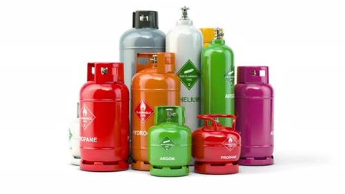 Colorful Industrial Gas Cylinders Rotating with Hazard Labels