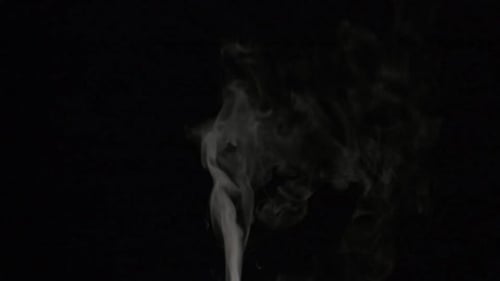 Rising Plume of Smoke on Black Background