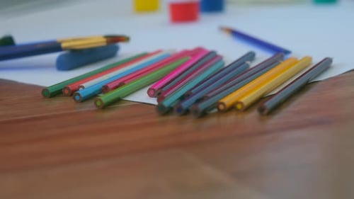 Art Supplies on a Wooden Table Ready to Create
