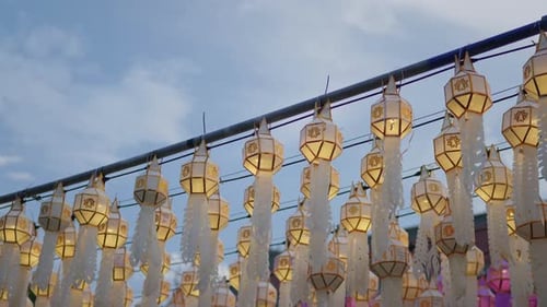 Hanging one hundred of multi colours lantern light lamp for Loy Krathong Festival in Lampune.