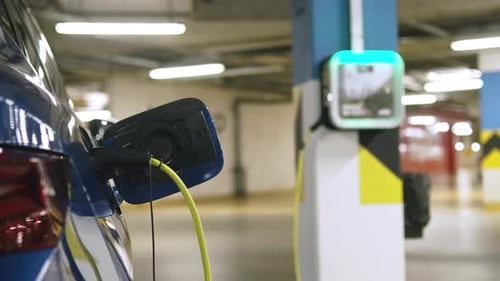 Ecofriendly Automobile Charged in Underground Parking Garage