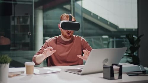 Futuristic Workflow Man Uses 3D Augmented Reality Glasses in Modern Office