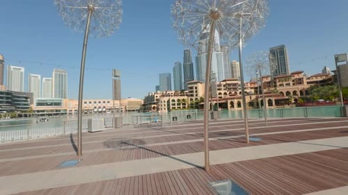 Dubai city architecture under blue sky.