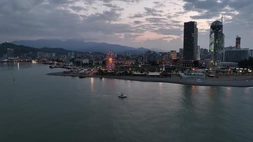 Aerial view of Batumi university and Alphabetic tower, skyscrapers and embankment of Batumi city