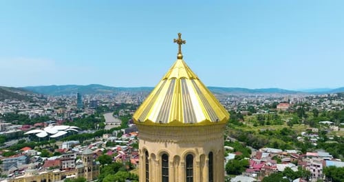 Close-up View Of The Golden Dome Of Holy Trinity Cathedral In Tbilisi, Georgia. Aerial Shot