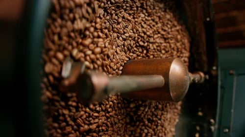 Coffee Beans Being Roasted in Roasting Machine