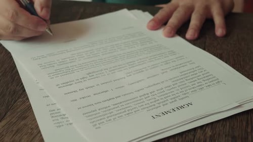 Businessman Hands Ready to Sign the Agreement Close Up