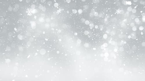 Falling Snowflakes with Bokeh for Winter Holiday Backgrounds