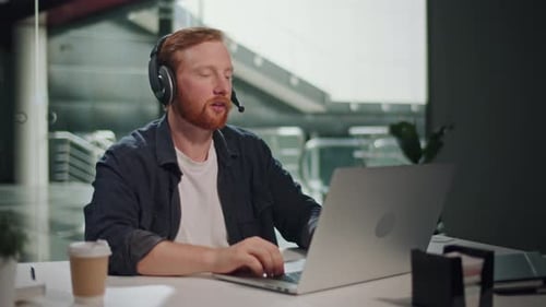 Online Support Client Communication Man Works Constantly Connected at Desk