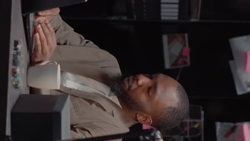 Adult Man Working at Desk in Office