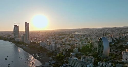 Coastal Cityscape at Sunrise Aerial View