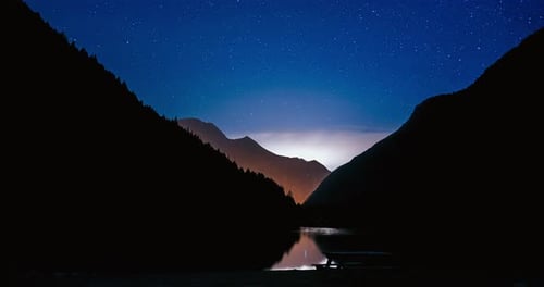 Night Mountain Lake Timelapse Landscape Moving Stars and Clouds on Sky at Travel