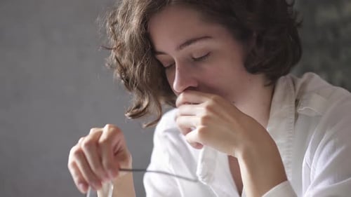 Woman Experiencing Headache, Taking Off Glasses, Rubbing Temples