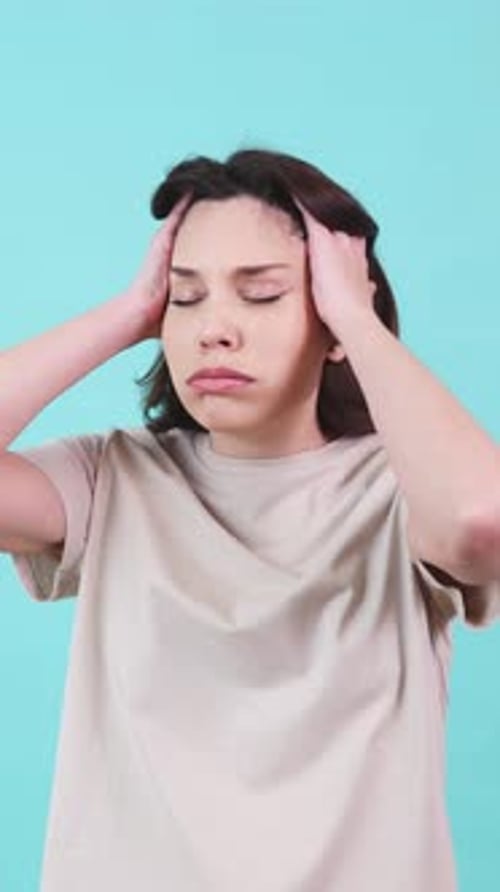 Woman Experiencing Headache or Stress Close Up