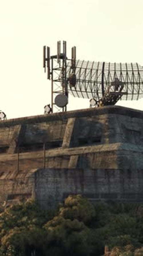A Military Base Satellite Dish on a Secluded Mountain Peak