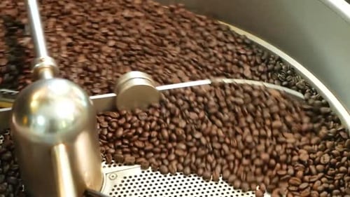 Coffee Beans Being Roasted in Industrial Machine