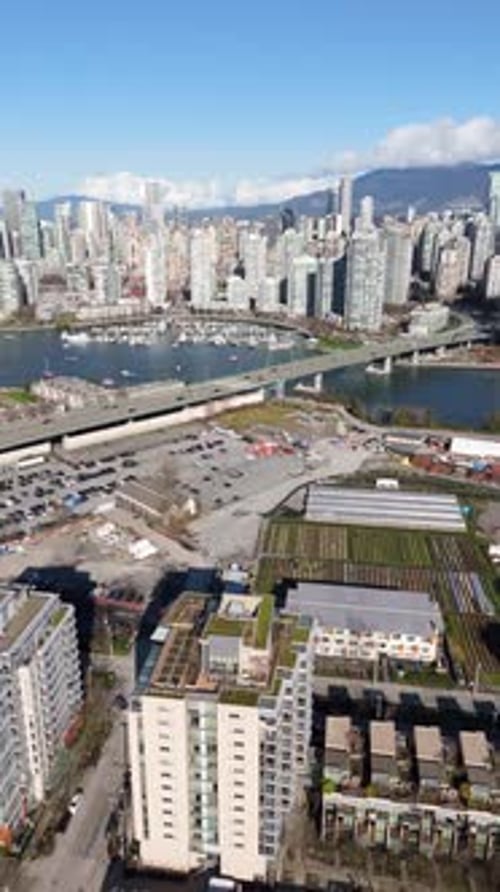 Yaletown Ferry Terminal And Waterfront Skyline With Cambie Bridge In Vancouver, British Columbia,