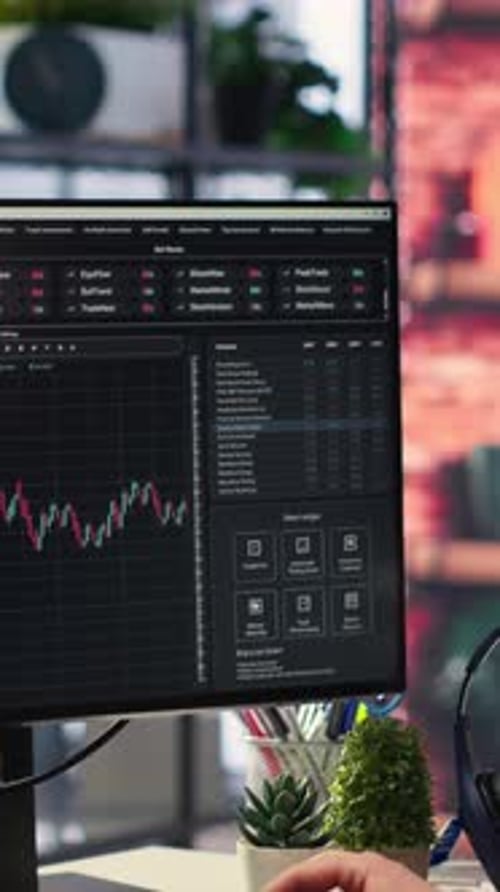 Vertical Video Businesswoman Studies Financial Charts Using Stock Market Visualization Tools