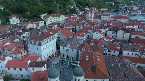 Exploring the Charming Rooftops of Kotor Montenegro During a Sunny Afternoon Stroll