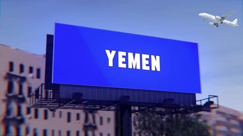 Yemen Road Sign With A Street Billboard And An Airplane Taking Off In The Background