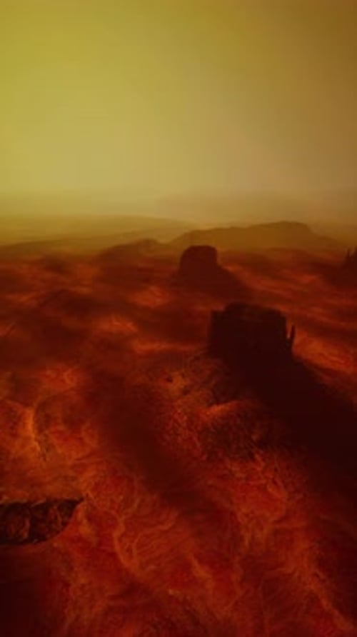 a Vast Desert Landscape with Dunes Sparse Vegetation and a Clear Sky