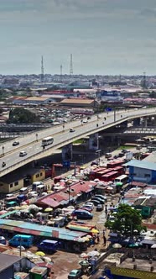 Aerial view of Accra, Ghana showcasing vibrant city life and traffic