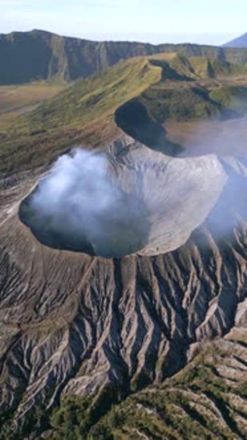 Aerial View of Mount Bromo Volcano Crater Smoking in East Java Indonesia