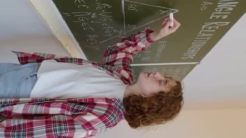 Red-haired College Student Solving Problem