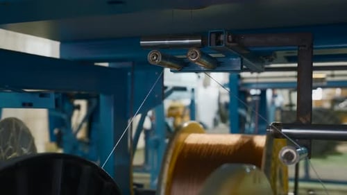 Distribution and winding of wires on coils at metallurgical enterprise.