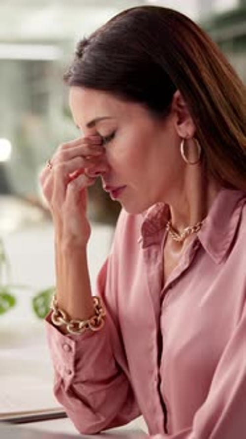 Business woman, eye strain and tired in office for headache, sinus and burnout with tension relief