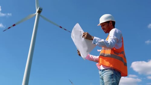 Indian Wind Turbine Engineer Asian Engineer Maintains and Controls Wind Turbine Energy Generation on