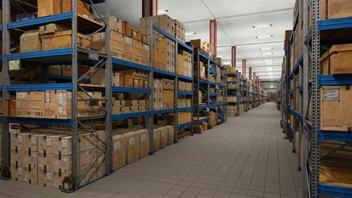 Industrial Warehouse Filled With Storage Boxes Labeled For Shipment