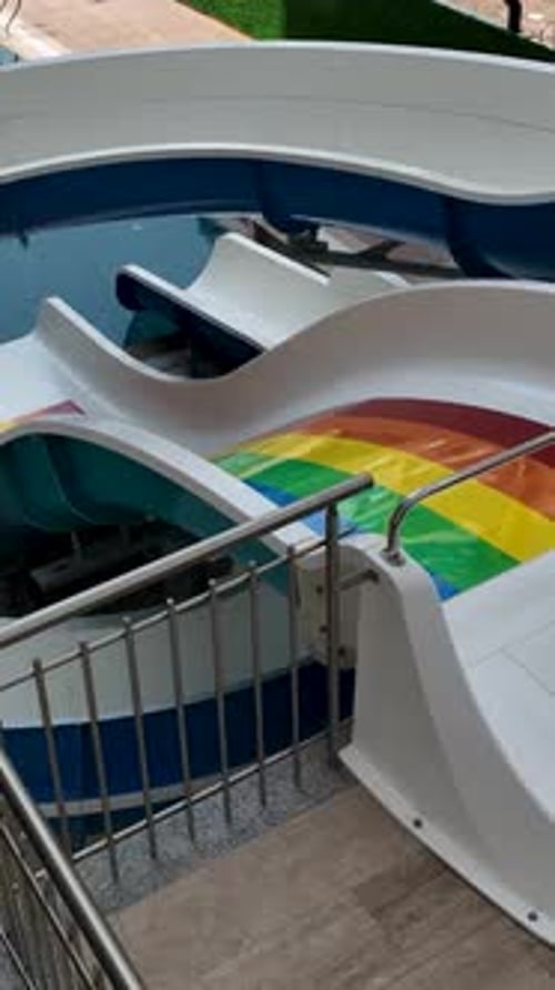 Vertical Video Aerial Exploration of Kid's Water Play Area New Water Slides and Splashes