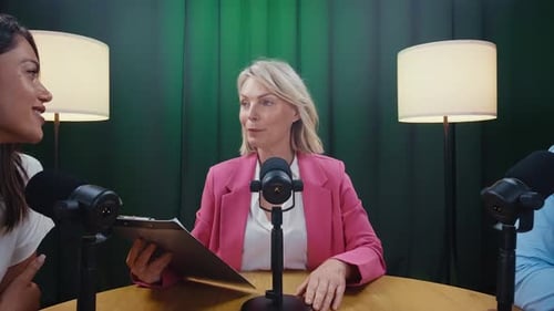 Professional podcasters recording interview