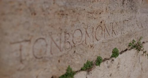 Close up of Greek text written in a stone in Hierapolis.