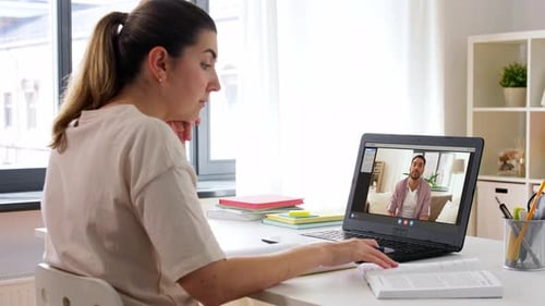 Education, Online School and Distant Learning Concept - Student Woman with Notebook