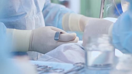Surgeons Perform Operation in Sterile Environment