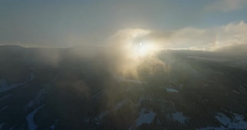Drone Exploration Over Snowy Mountains