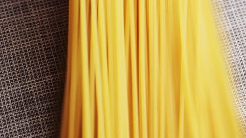 Italian Spaghetti or Noodle Macaroni Pasta Raw Food Background or Texture Close Up