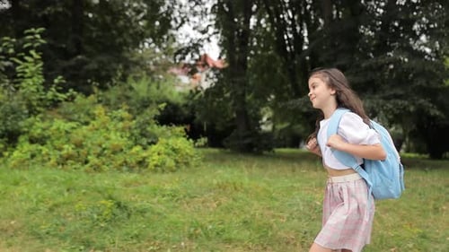 Girl Going to the School to Study at It After Summer Vacations