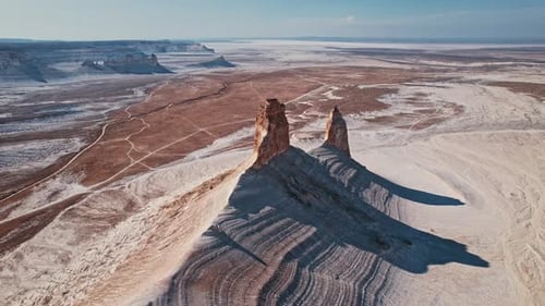 Enjoy a Breathtaking Aerial View of a Unique Desert Rock Formation That Captivates the Imagination