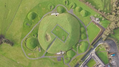 Bird's Eye View Of Knowth - Knowth Passage Tomb In Daytime In County Meath, Ireland. - aerial shot