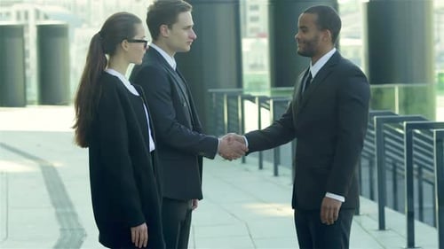 Young Business People Meeting in City