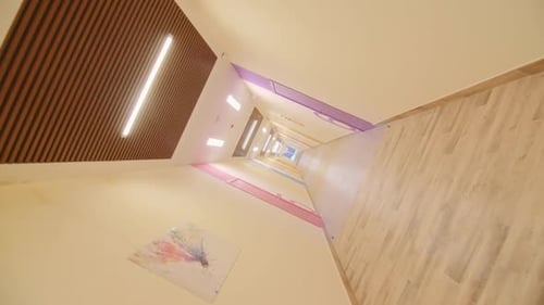 Empty Corridor with Bright Color Numbered Doors in School
