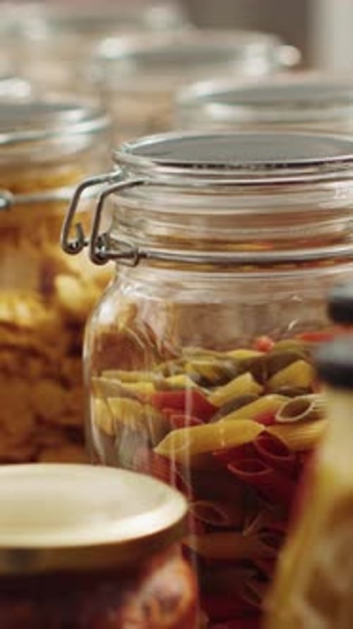 Jars of Pasta and Preserved Food Items