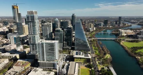 Aerial shot of downtown Austin, TX with the Colorado River in frame
