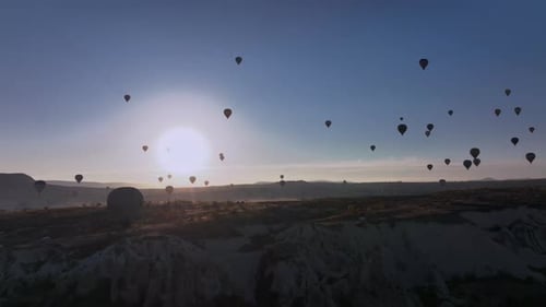 Scenic Hot Air Balloons Over Dreamy Landscape at Sunrise